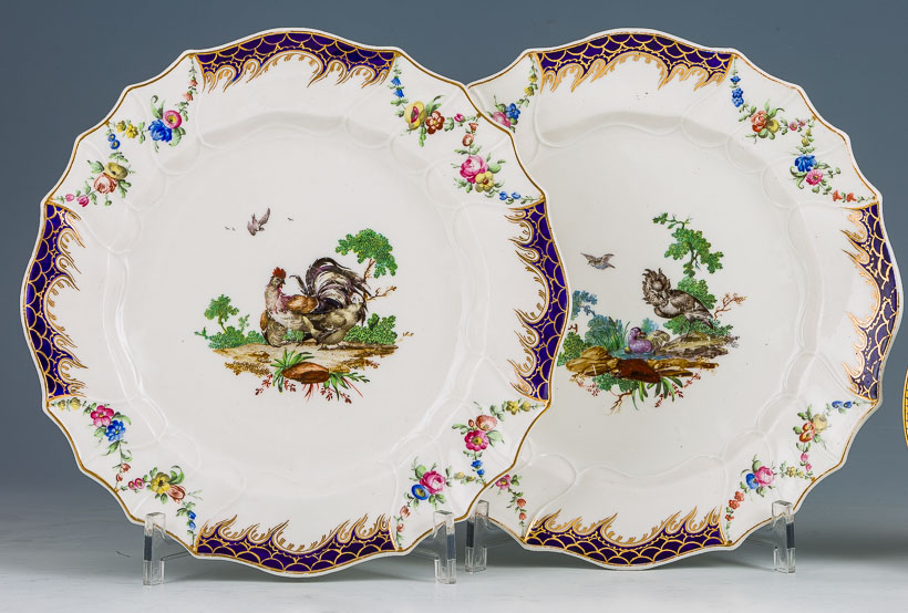 Two Hague-decorated Tournai plates with Duvivier bird decoration